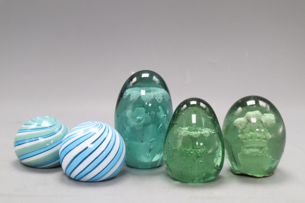 Two glass swirl paperweights and three glass dump paperweights, one with Prince of Wales feathers sulphide, height 6cm - 11.5cm